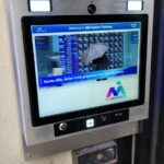 mvi keycom system mounted on wall by building entrance
